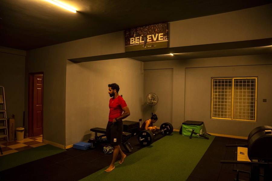 Coach on the turf lane of the UnReal strength and conditioning gym in East Bengaluru